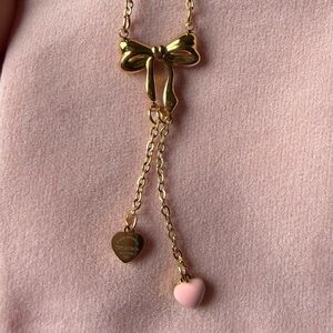 Gold Bow Necklace with Pink Heart Charm